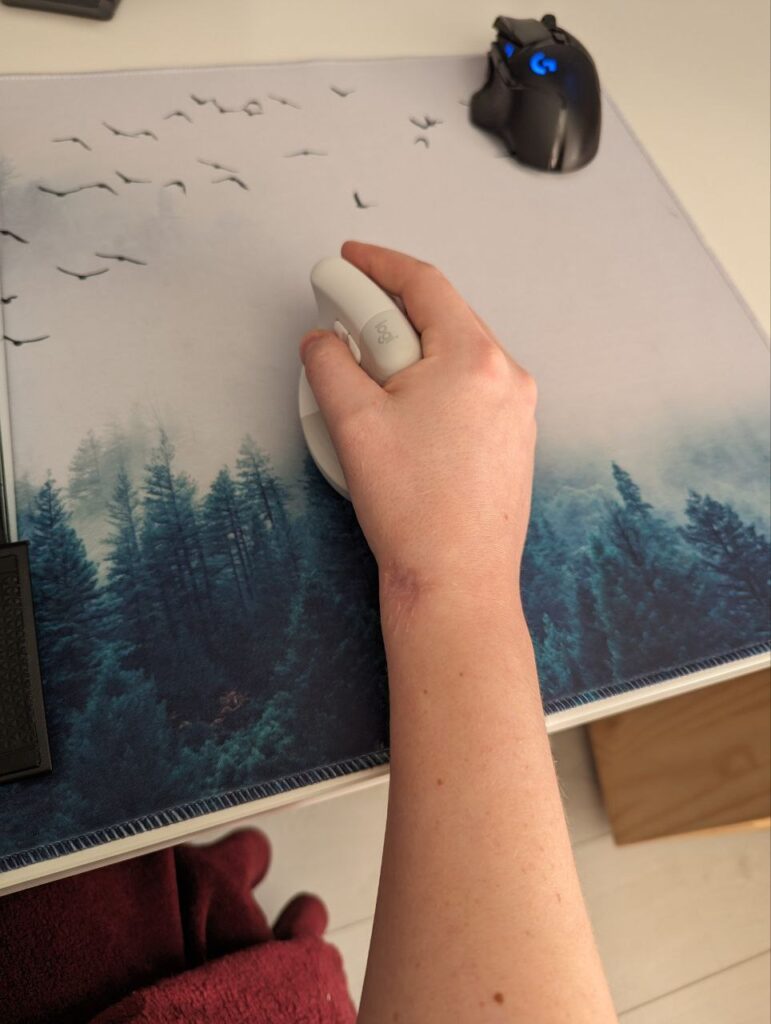 holding an ergo mouse